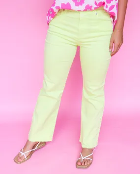 High Rise Kick Flare Jeans with Raw Cut Hem in Lime